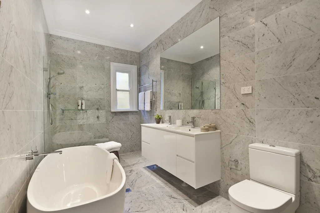 Modern luxury bathroom blending classic elegance by Bathroom Renovations Kapiti